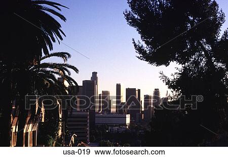 Stock Photo - Sunset Skyscrapers in Downtown Los Angeles. Fotosearch
