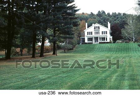 Stock Photograph - View across Lawn to White House Orford New Hampshire. Fotosearch