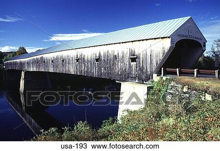 Stock Image - Wooden Covered Bridge New Hampshire USA. Fotosearch