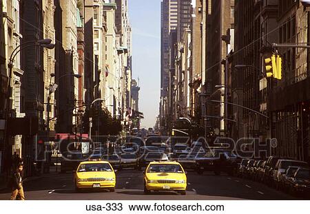 Yellow Cabs on 5th Avenue New York City USA View Large Photo Image Stock Image - Yellow Cabs on 5th Avenue New York City USA. Fotosearch