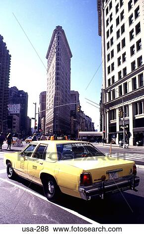 Yellow Taxi and Flat-iron Building New York View Large Photo Image Stock Photo - Yellow Taxi and Flat-iron Building New York. Fotosearch