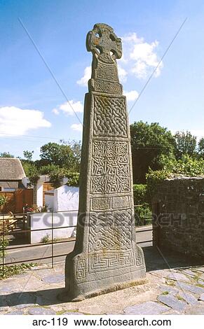 Stock Photo - 11th Century Celtic Cross in Churchyard Carew Wales. Fotosearch