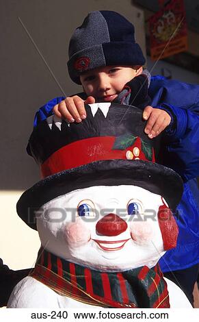 Child Playing on Model Snowman Austria View Large Photo Image Stock Image - Child Playing on Model Snowman Austria. Fotosearch