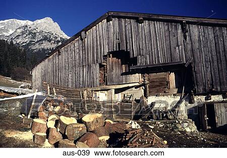 Chopped Logs in front of Barn Tyrol Austria View Large Photo Image Stock Photo - Chopped Logs in front of Barn Tyrol Austria. Fotosearch