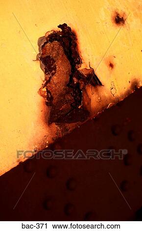 Close Up of Rust Damage on Yellow Painted Girder View Large Photo Image Stock Image - Close Up of Rust Damage on Yellow Painted Girder. Fotosearch