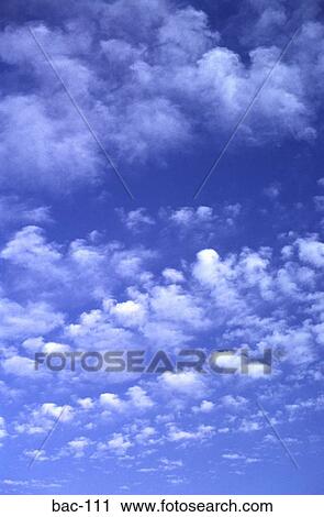 Stock Image - Clouds and Blue Sky. Fotosearch
