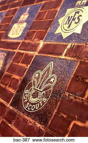 Crests of Various Organisations on Brick Wall View Large Photo Image Stock Photo - Crests of Various Organisations on Brick Wall. Fotosearch