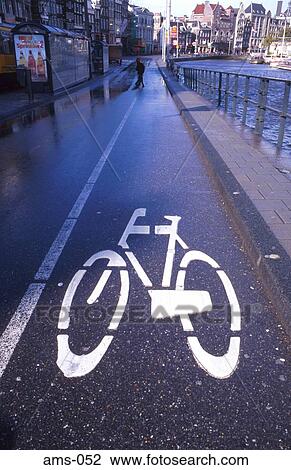 Stock Image - Cycle Lane Sign Painted on Road Amsterdam Holland. Fotosearch