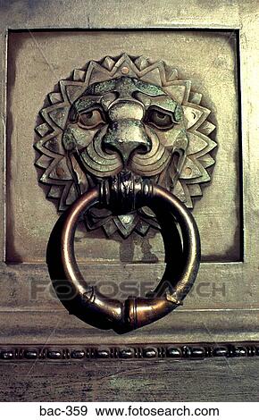 Door Knocker in the Shape of a Lions Head View Large Photo Image Stock Photo - Door Knocker in the Shape of a Lions Head. Fotosearch