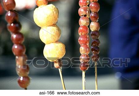 Stock Photograph - Glazed Fruit on Skewers. Fotosearch