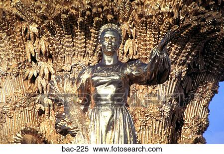 Gold Figure of Woman Worker View Large Photo Image Stock Photography - Gold Figure of Woman Worker. Fotosearch