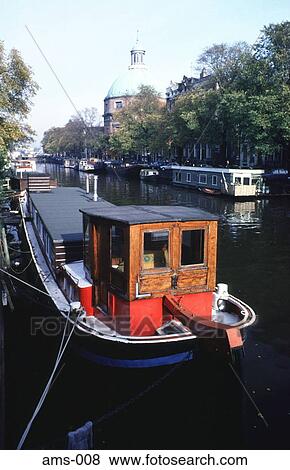 Houseboat on Singel Canal Amsterdam View Large Photo Image Stock Photo - Houseboat on Singel Canal Amsterdam. Fotosearch