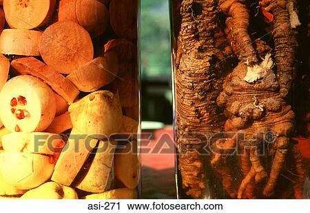 Stock Image - Jars of Ginseng and Pickled Fruit Korea Asia. Fotosearch