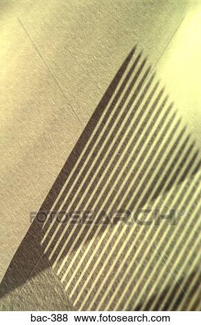 Stock Photo - Lines of Shadow Cast by a Comb. Fotosearch