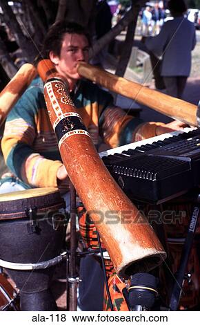 Man Playing Didgeridoo in a Band Eumundi Australia View Large Photo Image Stock Photo - Man Playing Didgeridoo in a Band Eumundi Australia. Fotosearch