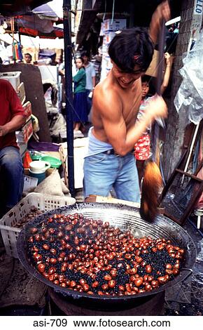 Man Roasting Chestnuts Manila The Philippines Asia View Large Photo Image Stock Photo - Man Roasting Chestnuts Manila The Philippines Asia. Fotosearch