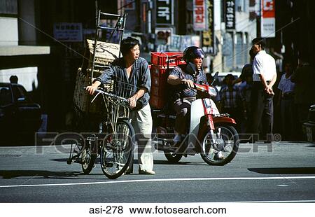 Men on Mopeds Seoul Korea Asia View Large Photo Image Stock Photo - Men on Mopeds Seoul Korea Asia. Fotosearch