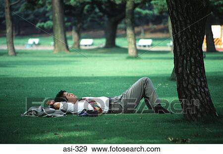 Office Worker Resting in a Park Tokyo Japan Asia View Large Photo Image Stock Photo - Office Worker Resting in a Park Tokyo Japan Asia. Fotosearch