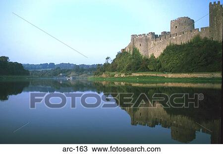 Pembroke Castle Reflected in Water Wales UK View Large Photo Image Stock Image - Pembroke Castle Reflected in Water Wales UK. Fotosearch