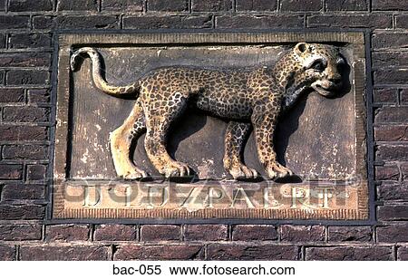 Stock Photography - Plaque in Wall Amsterdam. Fotosearch