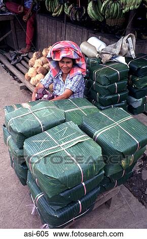 Produce Wrapped in Leaves The Philippines Asia View Large Photo Image Stock Photography - Produce Wrapped in Leaves The Philippines Asia. Fotosearch