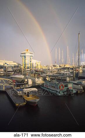 Rainbow Behind Boats in Harbour Australia View Large Photo Image Stock Image - Rainbow Behind Boats in Harbour Australia. Fotosearch