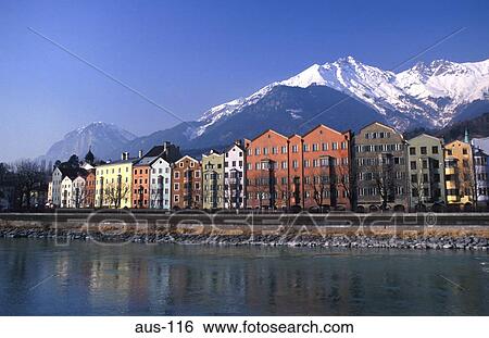 Stock Photograph - Row of Painted Houses Reflected in Inn Innsbruck. Fotosearch