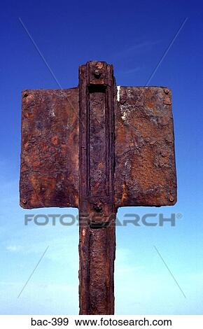Rusting Back of Iron Sign against Blue Sky View Large Photo Image Stock Photo - Rusting Back of Iron Sign against Blue Sky. Fotosearch