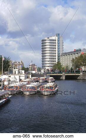 Sightseeing Boats at Open Haven Amsterdam Holland View Large Photo Image Stock Photography - Sightseeing Boats at Open Haven Amsterdam Holland. Fotosearch