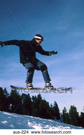 Picture - Snowboarder Jumping Austria. Fotosearch