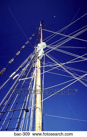Top Mast With Rigging against Clear Sky View Large Photo Image Stock Photo - Top Mast With Rigging against Clear Sky. Fotosearch