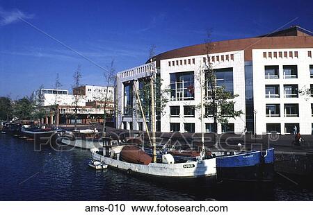 View of Stadoperahuis Beside Canal Boats Amsterdam View Large Photo Image Stock Image - View of Stadoperahuis Beside Canal Boats Amsterdam. Fotosearch