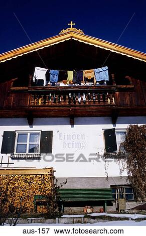 Washing and Wood Pile outside Tyrolean House Austria View Large Photo Image Stock Photo - Washing and Wood Pile outside Tyrolean House Austria. Fotosearch