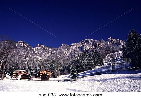 Wooden Buildings at the Foot of Alps Austria View Large Photo Image Stock Image - Wooden Buildings at the Foot of Alps Austria. Fotosearch