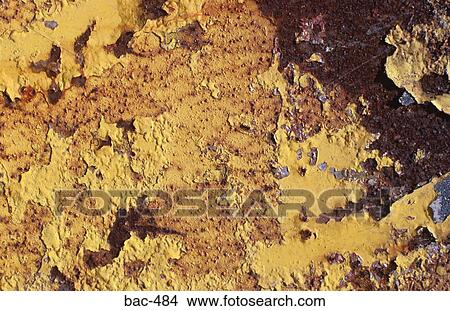 Picture - Yellow Paint Splatter on Metal Sheet. Fotosearch