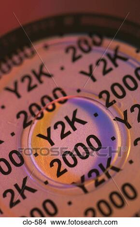 2000 and Y2K on Paper behind CD View Large Photo Image Picture - 2000 and Y2K on Paper behind CD. Fotosearch