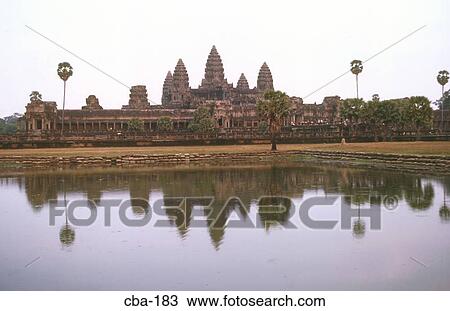 Stock Image - Angkor Wat Reflected in Moat Cambodia. Fotosearch