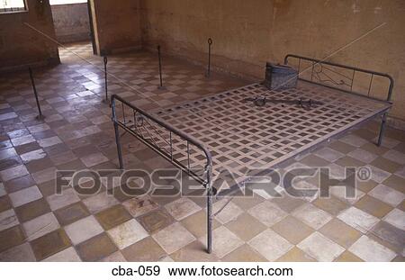 Stock Photo - Bed in the Tuol Sleng Museum Phnom Penh Cambodia. Fotosearch