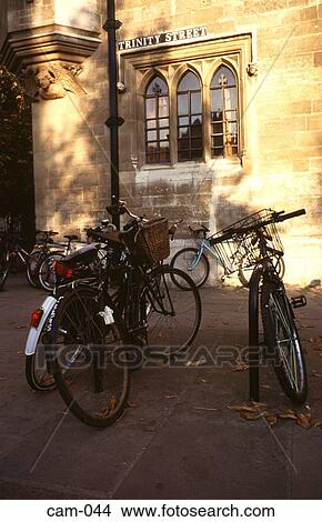 Bicycles in Trinity Street Cambridge UK View Large Photo Image Picture - Bicycles in Trinity Street Cambridge UK. Fotosearch