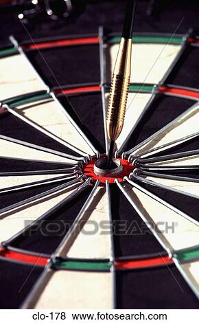 Brass Dart in Bulls Eye View Large Photo Image Stock Photo - Brass Dart in Bulls Eye. Fotosearch