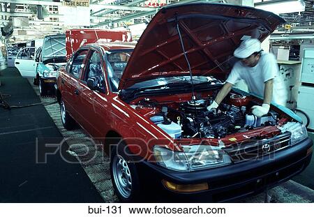 Car Assembly Worker Under Bonnet View Large Photo Image Stock Image - Car Assembly Worker Under Bonnet. Fotosearch