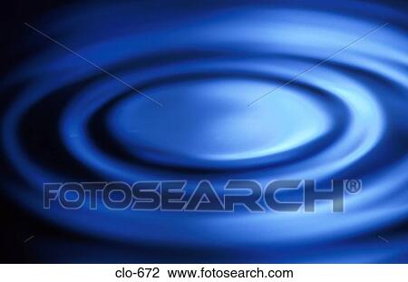 Stock Image - Circular Ripples in Blue Liquid. Fotosearch