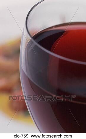 Stock Photo - Close Up of Glass of Red Wine. Fotosearch