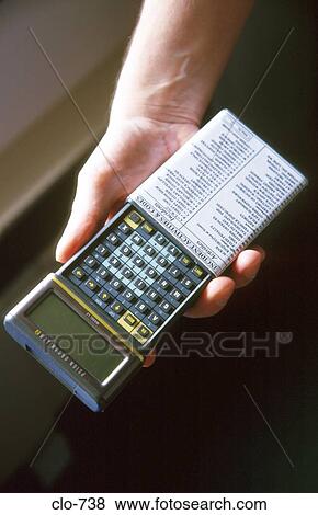 Close Up of Hand with Psion Organiser View Large Photo Image Stock Photo - Close Up of Hand with Psion Organiser. Fotosearch
