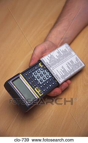 Close Up of Hand with Psion Organiser View Large Photo Image Stock Photo - Close Up of Hand with Psion Organiser. Fotosearch