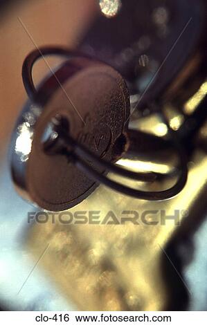Stock Photograph - Close Up of Key in Padlock. Fotosearch