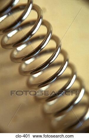 Stock Image - Close Up of Metal Spring. Fotosearch