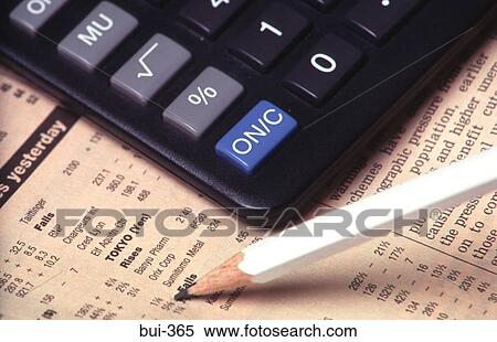 Close-up of Newspaper Calculator and Pencil View Large Photo Image Stock Photography - Close-up of Newspaper Calculator and Pencil. Fotosearch