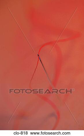 Close Up of Red Threat in Eye of Needle View Large Photo Image Stock Photo - Close Up of Red Threat in Eye of Needle. Fotosearch