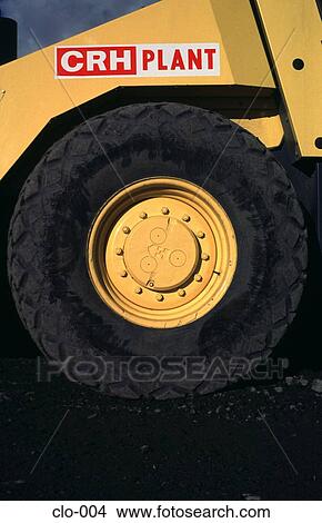 Close-up of the Wheel of a Heavy Industrial Vehicle View Large Photo Image Picture - Close-up of the Wheel of a Heavy Industrial Vehicle. Fotosearch